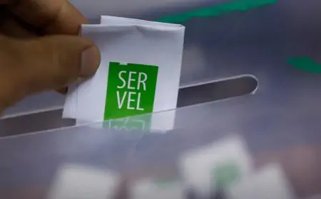 Servel y Servicio Nacional de Migraciones firman convenio para actualizar registro electoral de extranjeros en Chile