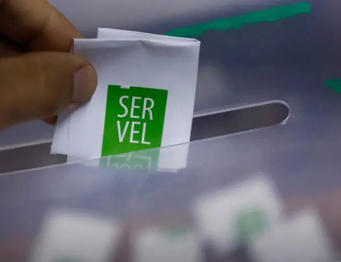 Servel y Servicio Nacional de Migraciones firman convenio para actualizar registro electoral de extranjeros en Chile